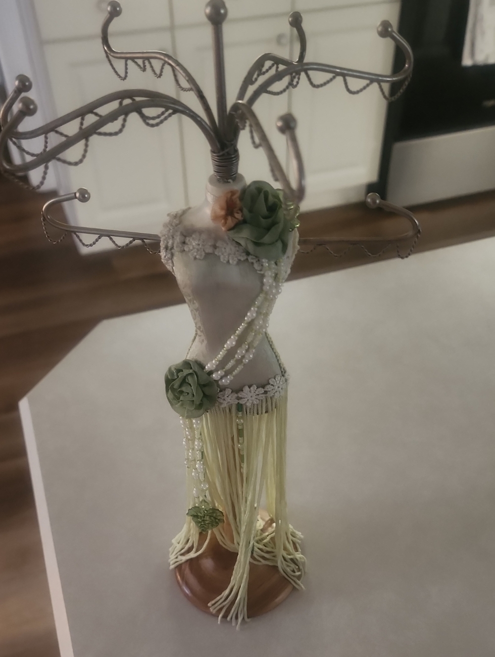 Decorative Dress Form Jewelry Stand with Green Floral Accents